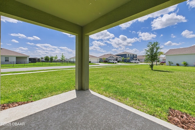 2625 Neverland Dr, New Smyrna Beach, FL 32168 - view of yard with a residential view and fence