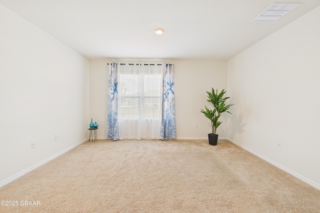 2625 Neverland Dr, New Smyrna Beach, FL 32168 - carpeted spare room featuring visible vents and baseboards