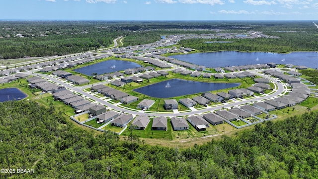 2625 Neverland Dr, New Smyrna Beach, FL 32168 - drone / aerial view featuring a water view and a residential view