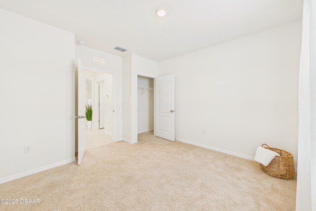 2625 Neverland Dr, New Smyrna Beach, FL 32168 - empty room with baseboards, carpet, and visible vents