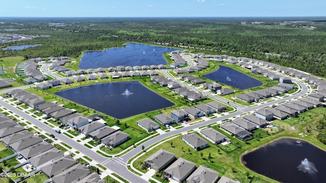 2625 Neverland Dr, New Smyrna Beach, FL 32168 - aerial view featuring a water view, a residential view, and a wooded view