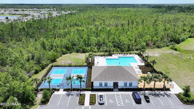 2625 Neverland Dr, New Smyrna Beach, FL 32168 - bird's eye view with a view of trees