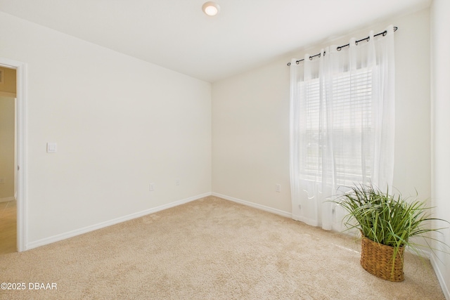 2625 Neverland Dr, New Smyrna Beach, FL 32168 - spare room with carpet flooring and baseboards