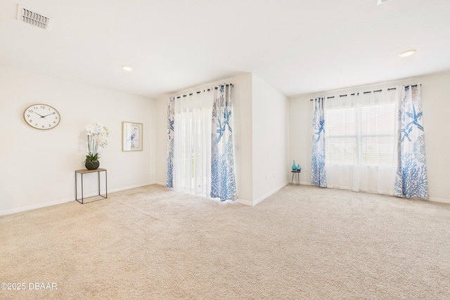 2625 Neverland Dr, New Smyrna Beach, FL 32168 - spare room with visible vents, baseboards, and carpet floors