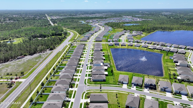 2625 Neverland Dr, New Smyrna Beach, FL 32168 - birds eye view of property with a water view, a residential view, and a wooded view