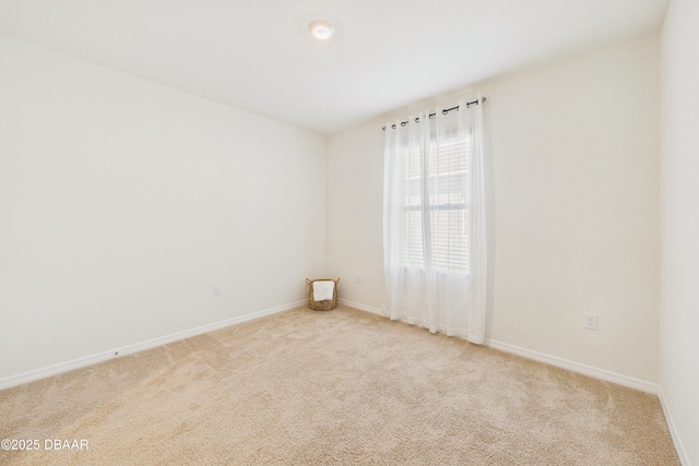 2625 Neverland Dr, New Smyrna Beach, FL 32168 - unfurnished room featuring baseboards and carpet flooring