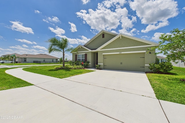 2625 Neverland Dr, New Smyrna Beach, FL 32168 - view of front of house featuring a front yard, an attached garage, stucco siding, and concrete driveway