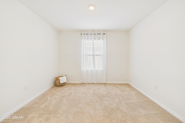 2625 Neverland Dr, New Smyrna Beach, FL 32168 - carpeted spare room featuring baseboards