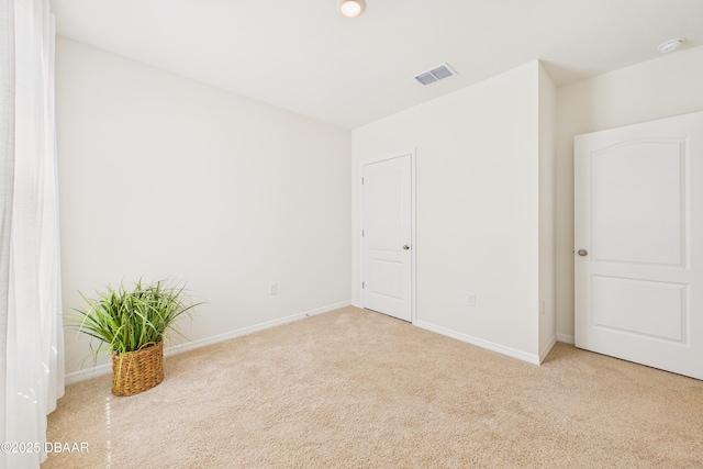 2625 Neverland Dr, New Smyrna Beach, FL 32168 - carpeted empty room with baseboards and visible vents