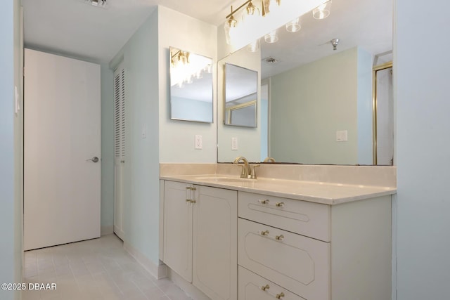 2425 S Atlantic Ave Unit 801, Daytona Beach Shores, FL 32118 - bathroom featuring vanity and tile patterned flooring