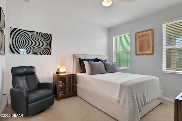 bedroom featuring carpet floors and baseboards