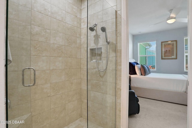 ensuite bathroom with connected bathroom and a shower stall