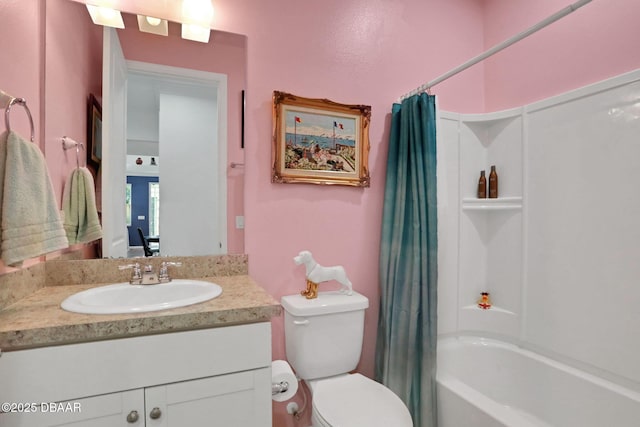 bathroom with toilet, shower / bath combo with shower curtain, and vanity