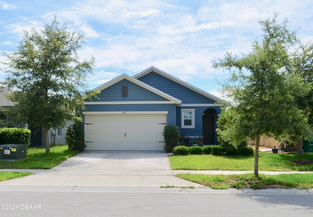 226 Meghan Cir, Deland, FL 32724 - ranch-style house featuring a garage, concrete driveway, and a front yard