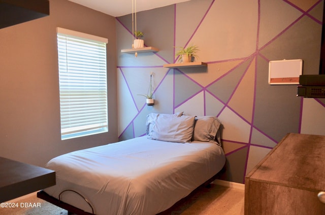 226 Meghan Cir, Deland, FL 32724 - carpeted bedroom featuring multiple windows and baseboards