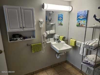 bathroom with sink and tile patterned floors