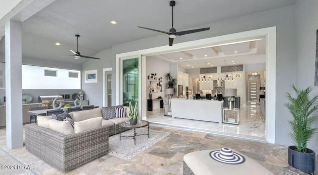 view of patio with an outdoor hangout area and ceiling fan