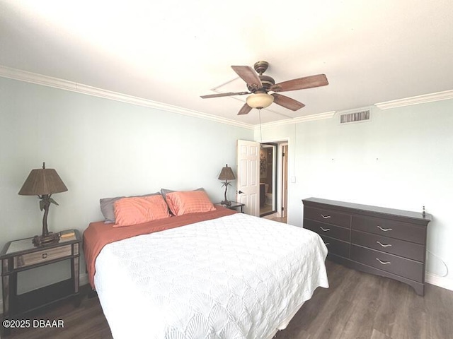 2800 N Atlantic Ave Unit 1206, Daytona Beach, FL 32118 - bedroom featuring dark wood finished floors, ornamental molding, and a ceiling fan