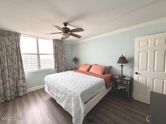 2800 N Atlantic Ave Unit 1206, Daytona Beach, FL 32118 - bedroom featuring crown molding, wood finished floors, baseboards, and a ceiling fan