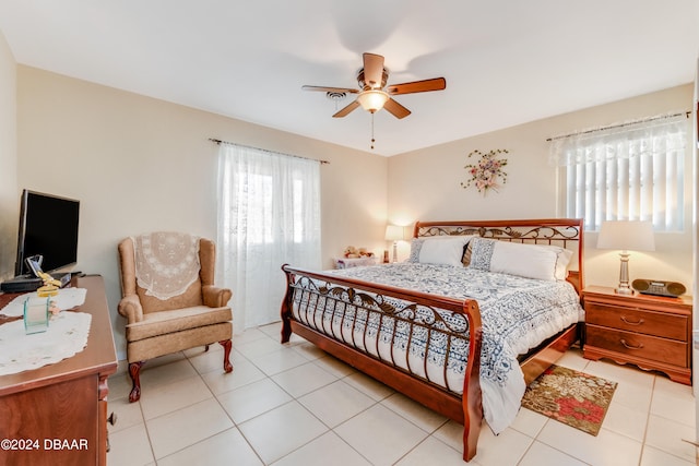 bedroom featuring ceiling fan and light tile patterned floors