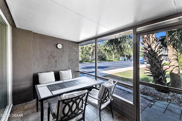 5500 Ocean Shore Blvd Unit 58, Ormond Beach, FL 32176 - sunroom / solarium featuring outdoor dining space