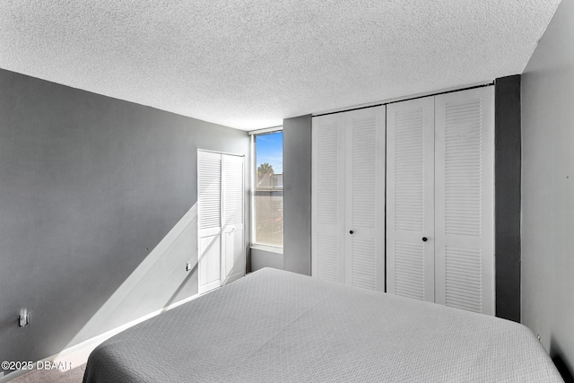 5500 Ocean Shore Blvd Unit 58, Ormond Beach, FL 32176 - bedroom with a textured ceiling and a closet
