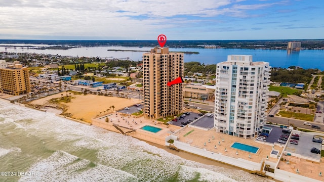 birds eye view of property featuring a water view