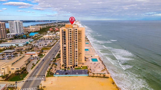 aerial view with a view of the beach and a water view