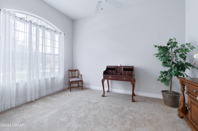 1317 Harwick Ln, Ormond Beach, FL 32174 - sitting room featuring carpet floors, ceiling fan, and baseboards