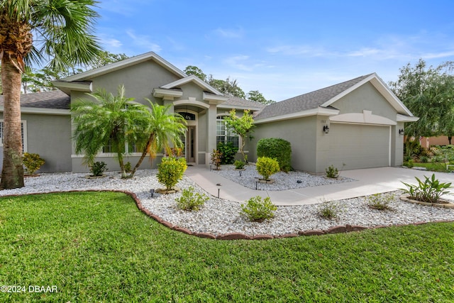 1317 Harwick Ln, Ormond Beach, FL 32174 - single story home with stucco siding, a front lawn, a garage, driveway, and a shingled roof