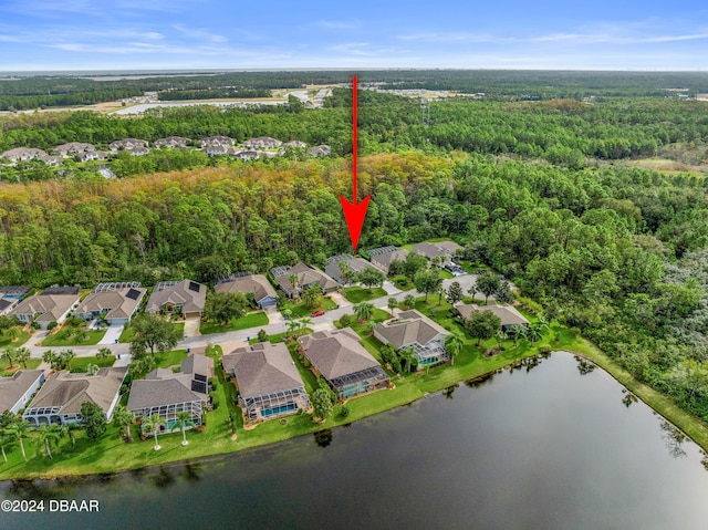1317 Harwick Ln, Ormond Beach, FL 32174 - aerial view of property's location featuring nearby suburban area, a heavily wooded area, and a large body of water