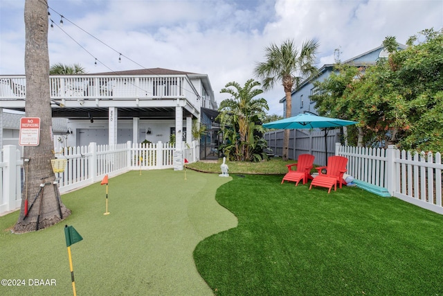 view of yard with a deck