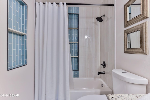 bathroom featuring toilet and shower / tub combo