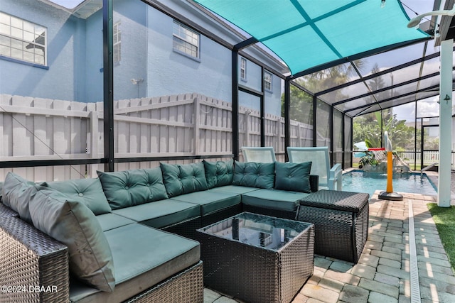 sunroom / solarium featuring a hot tub