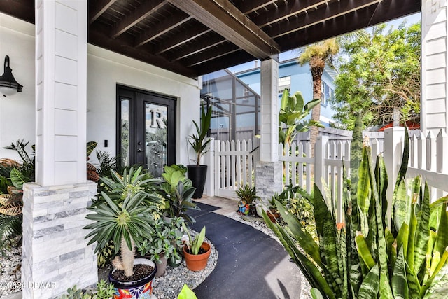 entrance to property featuring french doors