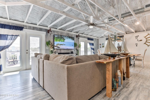 830 Maralyn Ave, New Smyrna Beach, FL 32169 - living area featuring light wood-style flooring, french doors, and a ceiling fan