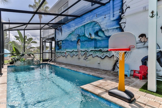 view of pool featuring a patio, a lanai, and pool water feature