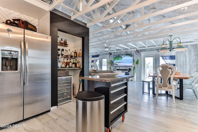 kitchen with french doors, stainless steel fridge, light wood-type flooring, beverage cooler, and ceiling fan