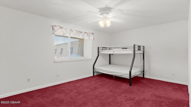 144 S Halifax Ave Unit 46, Daytona Beach, FL 32118 - bedroom with ceiling fan, carpet floors, and baseboards