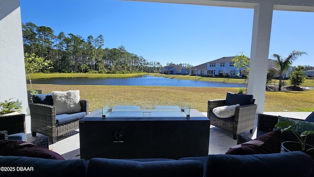 view of patio featuring a water view and an outdoor hangout area