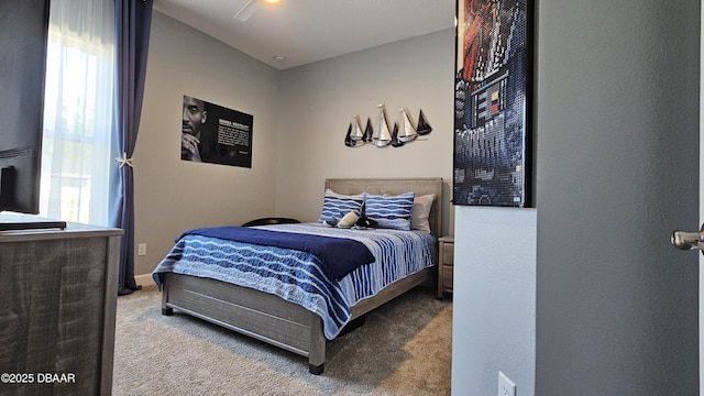 bedroom with carpet flooring and ceiling fan