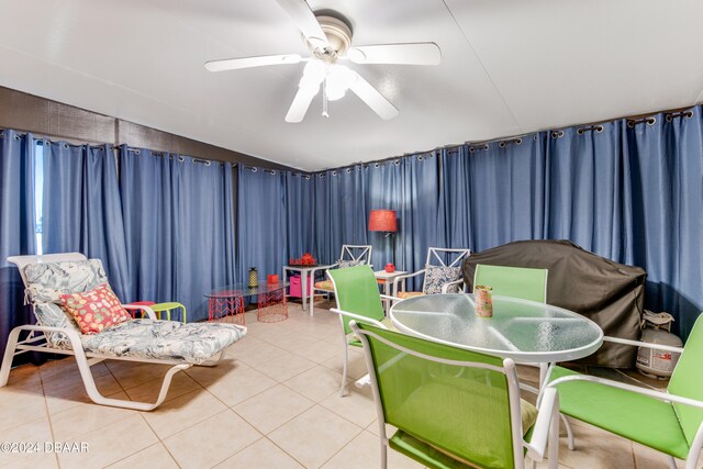 playroom featuring tile patterned floors and ceiling fan