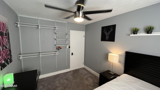 carpeted bedroom with baseboards and ceiling fan