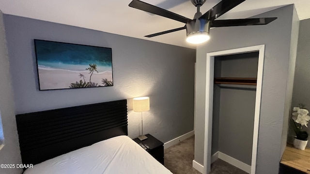 bedroom featuring a closet, baseboards, carpet, and ceiling fan