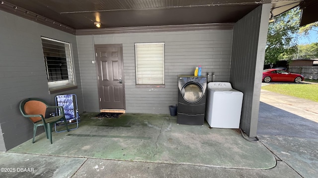 exterior space featuring separate washer and dryer