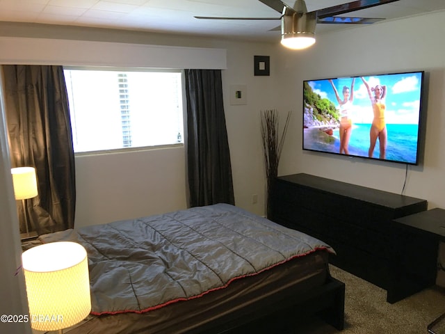 carpeted bedroom with a ceiling fan