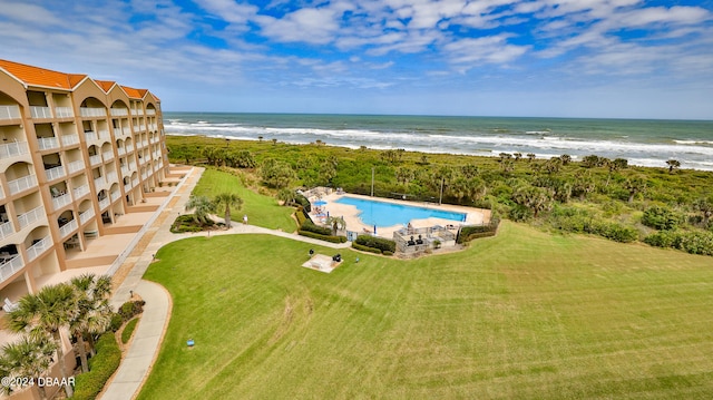 bird's eye view featuring a beach view and a water view