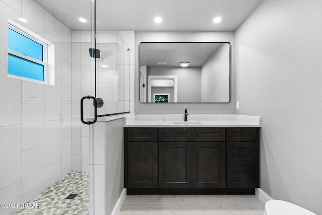 bathroom with toilet, an enclosed shower, vanity, and tile patterned floors