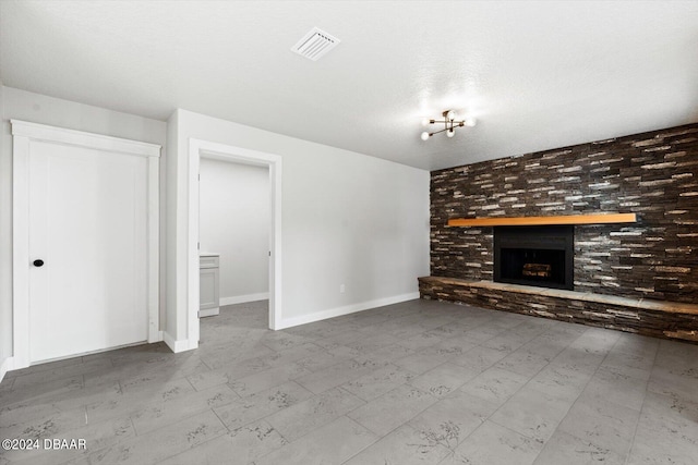 unfurnished living room featuring a textured ceiling