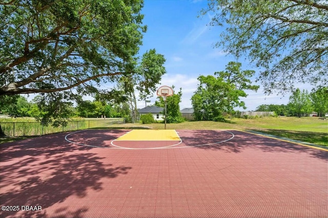 979 Leyburn Dr, Deltona, FL 32725 - view of sport court with fence, community basketball court, and a lawn